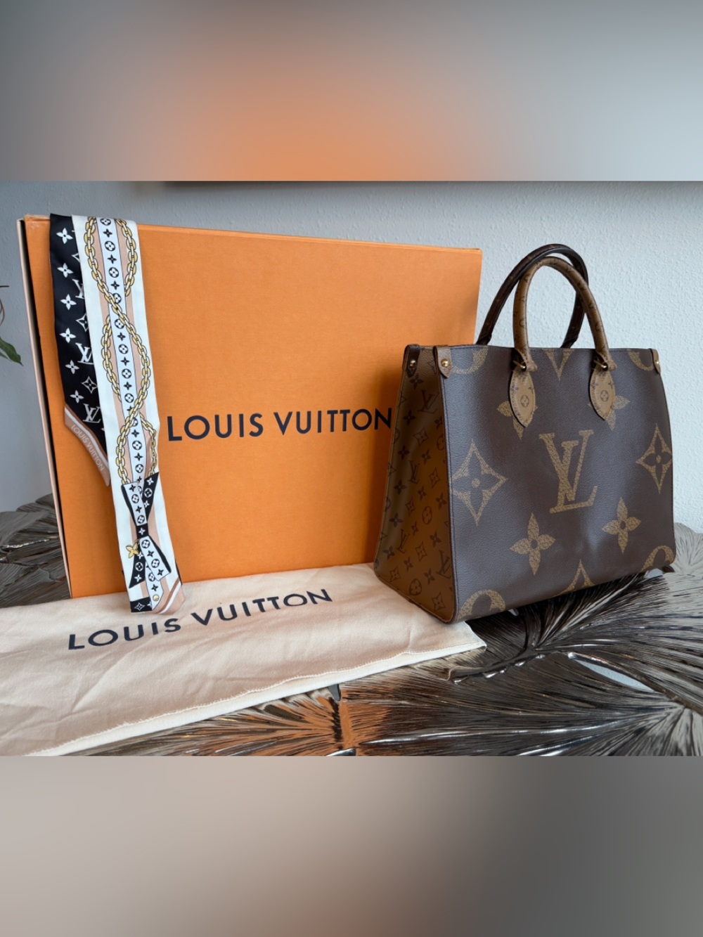 Louis Vuitton Monogram Tote with Black Straps and Red Interior.